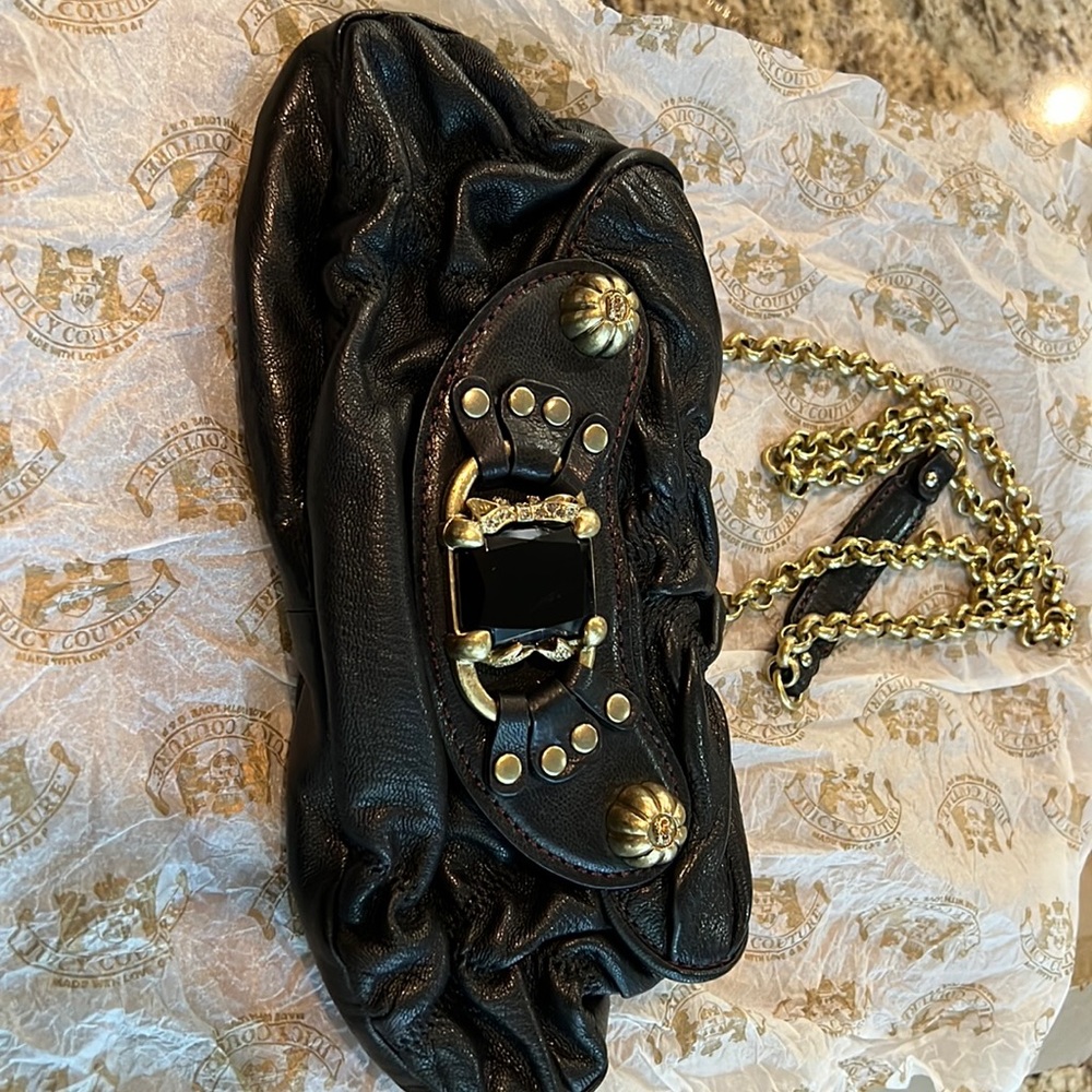 Juicy couture evening bag. Black. New. Never used.  Gold tone details & chain